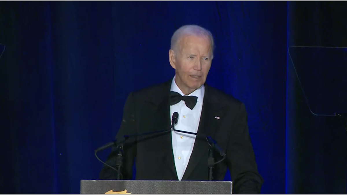 Biden speaking in black tie